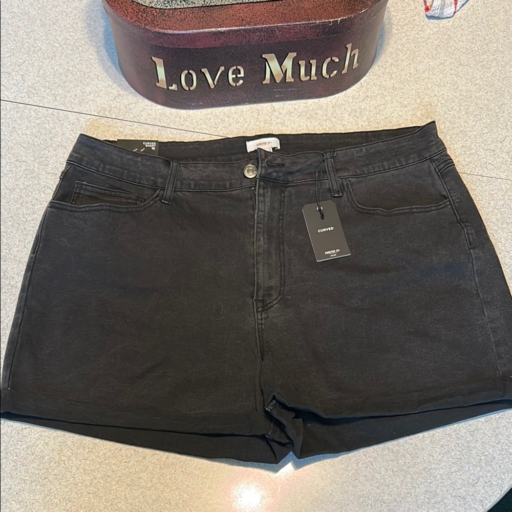 Forever 21+ - Stretch curved denim, size 18 black shorts. New with tags